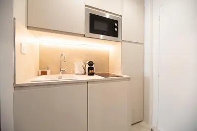Cuisine ou kitchenette dans l'établissement Charming Parisian Flat by Champs Elysées
