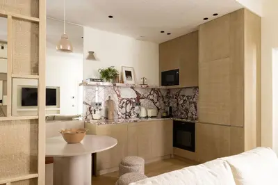 Cuisine ou kitchenette dans l'établissement Luxurious Residence Saint Honore by onefinestay