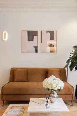 Coin salon dans l'établissement La Suite - Voltaire I - 1 bedroom with AC