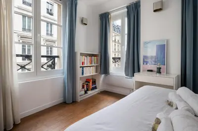 Un ou plusieurs lits dans un hébergement de l'établissement Appartement Rambuteau - Welkeys