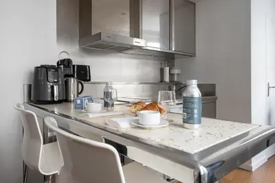 Cuisine ou kitchenette dans l'établissement Appartement Rambuteau - Welkeys