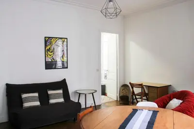 Coin salon dans l'établissement Bright stay in the heart of Paris for 4 people