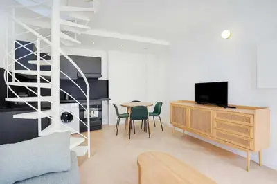 Télévision ou salle de divertissement dans l'établissement Duplex modern Montorgueil 4 Guests