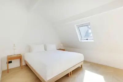 Un ou plusieurs lits dans un hébergement de l'établissement Duplex modern Montorgueil 4 Guests