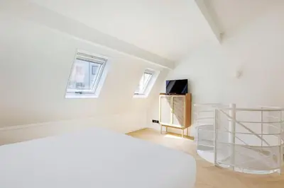 Un ou plusieurs lits dans un hébergement de l'établissement Duplex modern Montorgueil 4 Guests