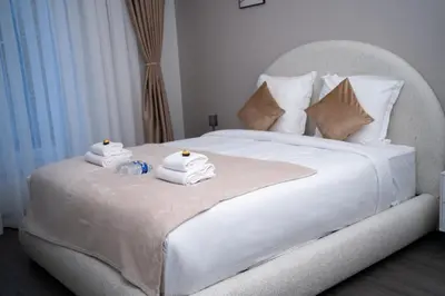 Un ou plusieurs lits dans un hébergement de l'établissement Hôtel Sofiane