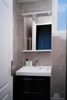 Salle de bains dans l'établissement Hôtel Sofiane