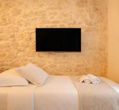 Un ou plusieurs lits dans un hébergement de l'établissement Le Marais - Premium studio for 3