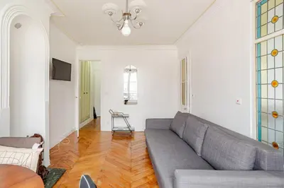 Télévision ou salle de divertissement dans l'établissement Beautiful apartment in Paris 9