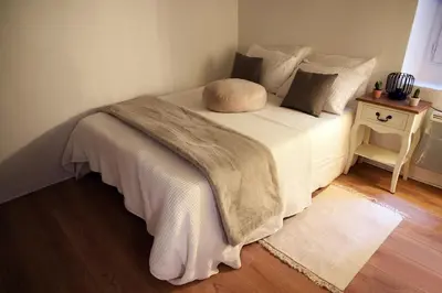 Un ou plusieurs lits dans un hébergement de l'établissement Cosy Flat Near Le Marais