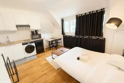 Cuisine ou kitchenette dans l'établissement Studio Cosy avec Ascenseur Paris 16 - 2 personnes