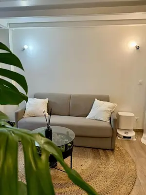 Coin salon dans l'établissement Duplex in Heart of Paris