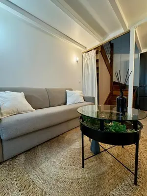 Coin salon dans l'établissement Duplex in Heart of Paris