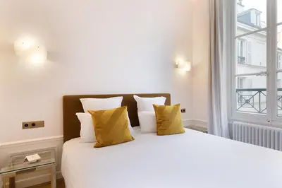Un ou plusieurs lits dans un hébergement de l'établissement Pick A Flat's Apartment in Saint Germain des Prés - Rue Furstemberg