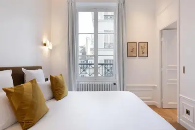 Un ou plusieurs lits dans un hébergement de l'établissement Pick A Flat's Apartment in Saint Germain des Prés - Rue Furstemberg
