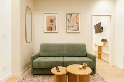 Coin salon dans l'établissement Appartement familiale parfait pour 4p - paris 13