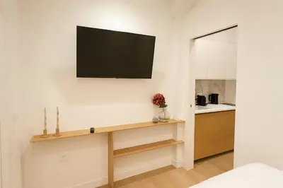 Télévision ou salle de divertissement dans l'établissement Appartement familiale parfait pour 4p - paris 13