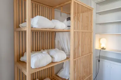 Un ou plusieurs lits dans un hébergement de l'établissement Luxury Flat Eiffel View 3BR 7 Guests
