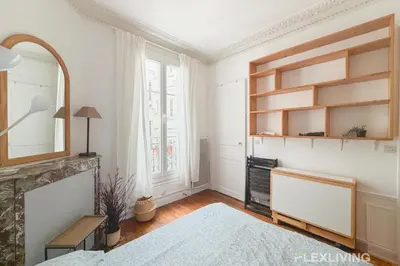 Un ou plusieurs lits dans un hébergement de l'établissement Lovely Studio in Paris 13