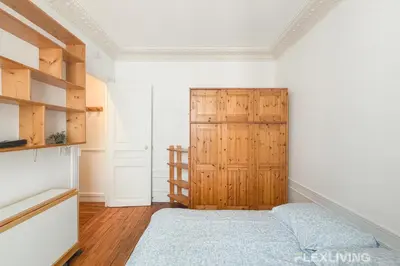 Un ou plusieurs lits dans un hébergement de l'établissement Lovely Studio in Paris 13