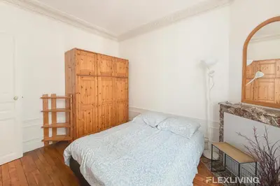 Un ou plusieurs lits dans un hébergement de l'établissement Lovely Studio in Paris 13