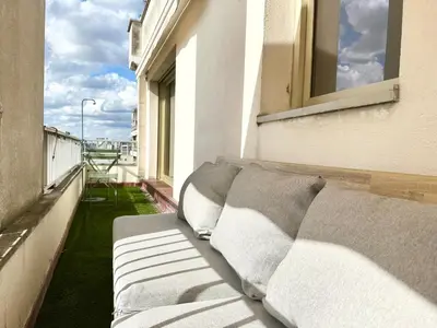 Coin salon dans l'établissement L'Amelot - Studio avec terrasse Paris 11e