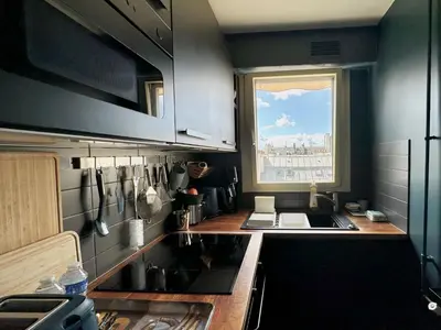 Cuisine ou kitchenette dans l'établissement L'Amelot - Studio avec terrasse Paris 11e