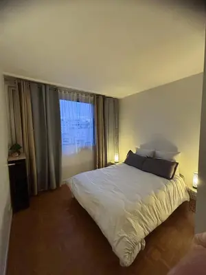Un ou plusieurs lits dans un hébergement de l'établissement Luxe 2 bedrooms Paris 14th & Montrouge