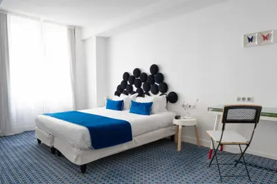 Un ou plusieurs lits dans un hébergement de l'établissement Hotel 34B - Astotel