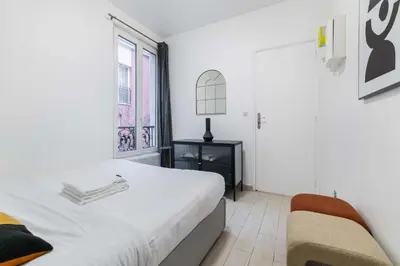 Un ou plusieurs lits dans un hébergement de l'établissement Appartement cosy hopital bichat - paris 18 - 4P
