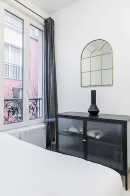 Un ou plusieurs lits dans un hébergement de l'établissement Appartement cosy hopital bichat - paris 18 - 4P