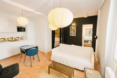 Un ou plusieurs lits dans un hébergement de l'établissement Appartement rue Montorgueil au Halles - Paris 1