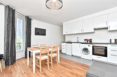 Cuisine ou kitchenette dans l'établissement Charming apartment - 1BR 6P - Opéra Garnier