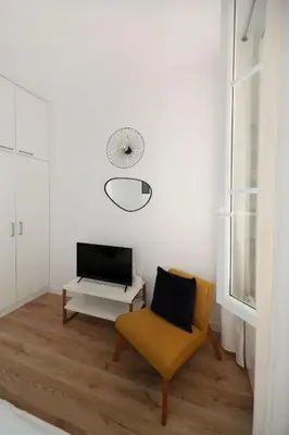 Télévision ou salle de divertissement dans l'établissement Studio original et reposant - Paris 10 - 2P