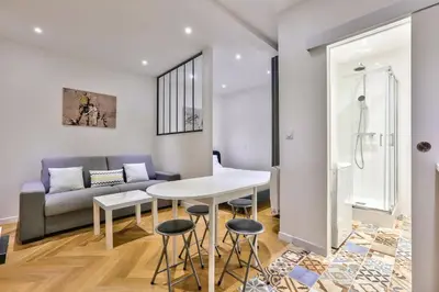 Coin salon dans l'établissement Bonne Nouvelle Paris 2e Charmant appartement 4P