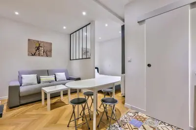 Coin salon dans l'établissement Bonne Nouvelle Paris 2e Charmant appartement 4P