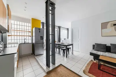 Cuisine ou kitchenette dans l'établissement Appartement familial proche des commerces - 8P