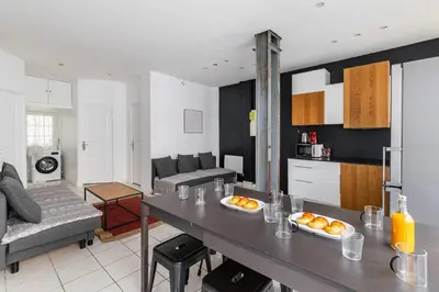 Cuisine ou kitchenette dans l'établissement Appartement familial proche des commerces - 8P