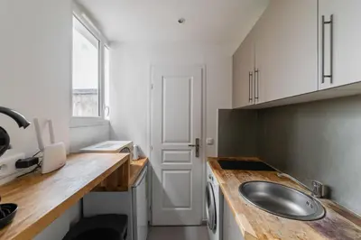Cuisine ou kitchenette dans l'établissement Studio cosy metro saint Paul - Paris 3 - 2P