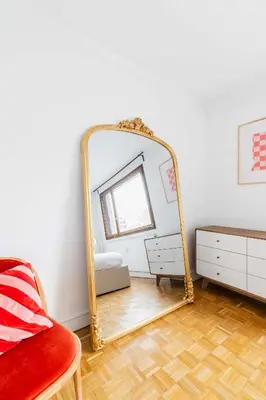 Un ou plusieurs lits dans un hébergement de l'établissement Appartement Paisible proche parc des princes - 4P