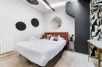 Un ou plusieurs lits dans un hébergement de l'établissement 2 pieces Buttes chaumont parfait pour famille