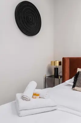 Un ou plusieurs lits dans un hébergement de l'établissement 2 pieces Buttes chaumont parfait pour famille