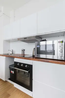 Cuisine ou kitchenette dans l'établissement Appartement cosy refait a neuf - Paris 19 - 4P