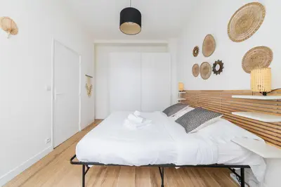 Un ou plusieurs lits dans un hébergement de l'établissement Appartement cosy refait a neuf - Paris 19 - 4P