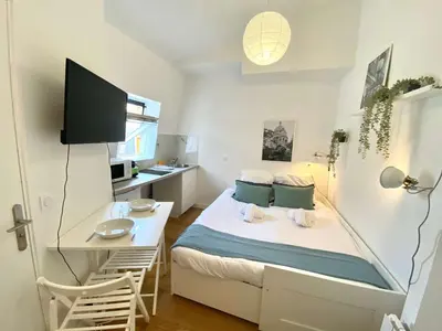 Un ou plusieurs lits dans un hébergement de l'établissement New 468 Suite Eddy - Cosy Apartment Paris Center
