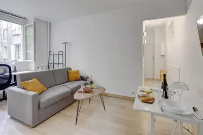 Coin salon dans l'établissement 517 Suite Raffet - Cozy Studio Paris 16