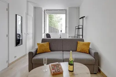 Coin salon dans l'établissement 517 Suite Raffet - Cozy Studio Paris 16