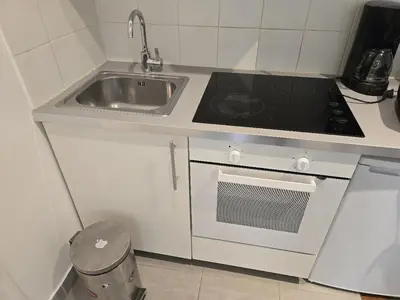 Cuisine ou kitchenette dans l'établissement 26 rue Jean de la Fontaine - Bail mobilité
