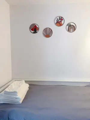 Un ou plusieurs lits dans un hébergement de l'établissement Modern Studio near Montmartre & Opéra