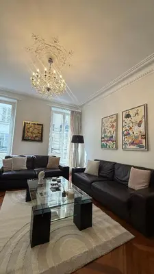 Coin salon dans l'établissement Champs Elysée Apprt II